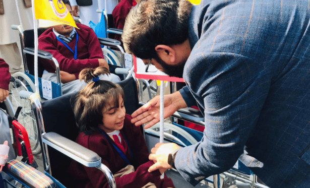 Group photo of volunteers and community members
